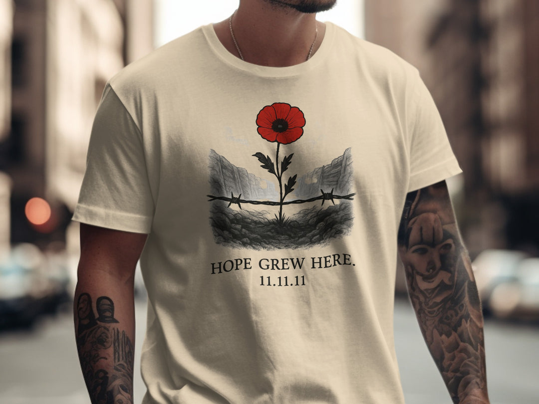 poppy growing through barbed wire trench — men’s remembrance day t-shirt