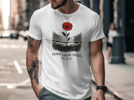 poppy growing through barbed wire trench — men’s remembrance day t-shirt