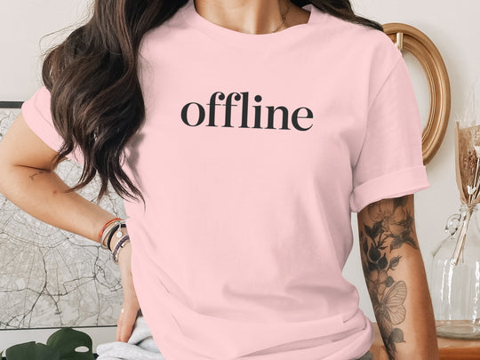 offline women’s t-shirt with minimalist corner wordmark on black