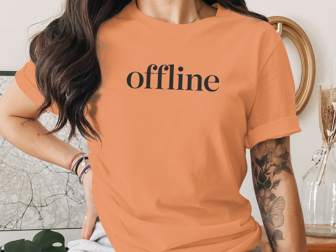 offline women’s t-shirt with minimalist corner wordmark on black