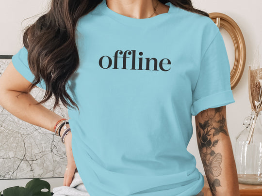 offline women’s t-shirt with minimalist corner wordmark on black