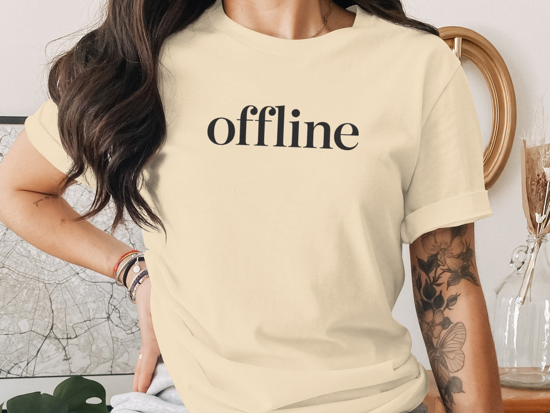 offline women’s t-shirt with minimalist corner wordmark on black