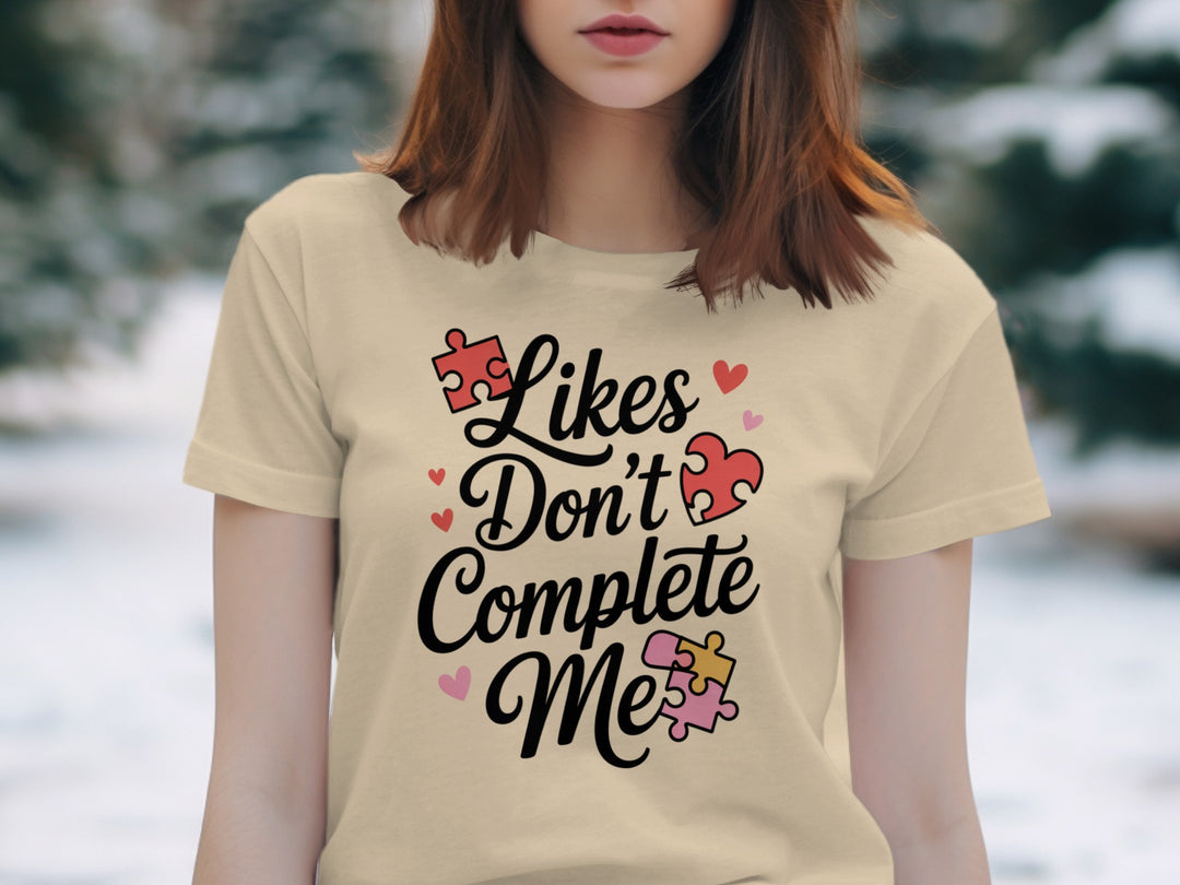likes don’t complete me puzzle-heart graphic — women’s t-shirt
