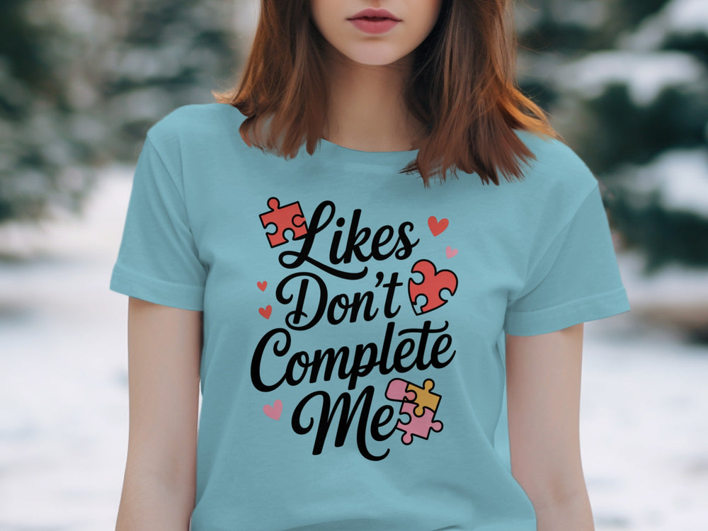 likes don’t complete me puzzle-heart graphic — women’s t-shirt