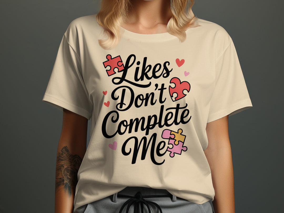 likes don’t complete me puzzle-heart graphic — women’s t-shirt