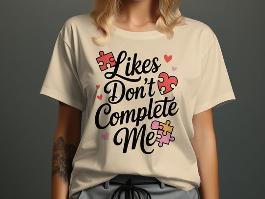 likes don’t complete me puzzle-heart graphic — women’s t-shirt