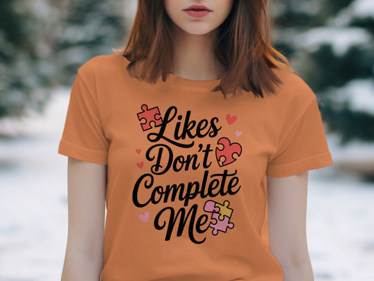 likes don’t complete me puzzle-heart graphic — women’s t-shirt