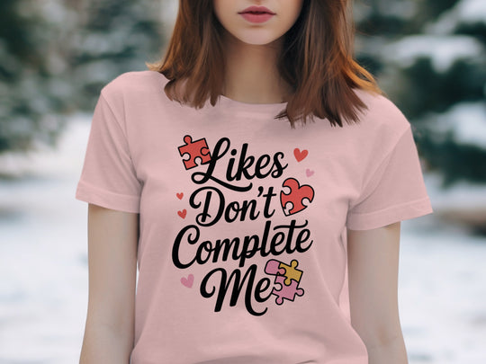 likes don’t complete me puzzle-heart graphic — women’s t-shirt