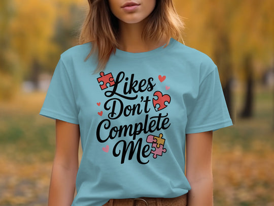 likes don’t complete me puzzle-heart graphic — women’s t-shirt