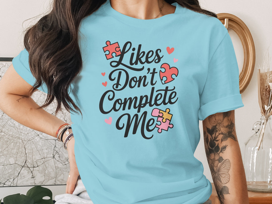 likes don’t complete me puzzle-heart graphic — women’s t-shirt