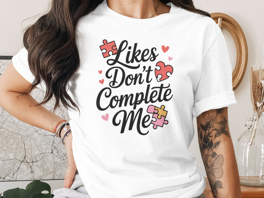 likes don’t complete me puzzle-heart graphic — women’s t-shirt