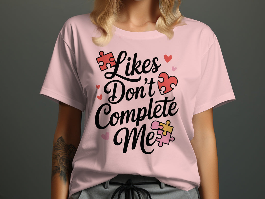 likes don’t complete me puzzle-heart graphic — women’s t-shirt