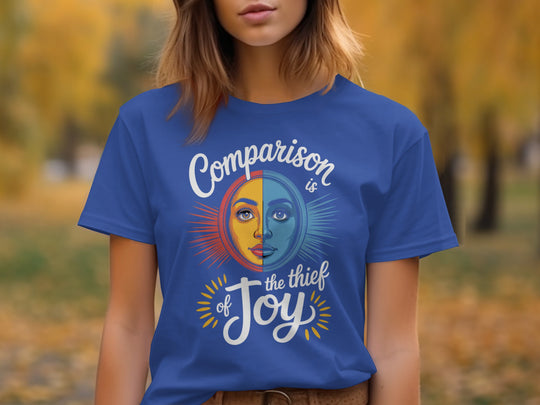 comparison is the thief of joy split sun-and-moon face — women’s t-shirt