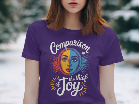 comparison is the thief of joy split sun-and-moon face — women’s t-shirt