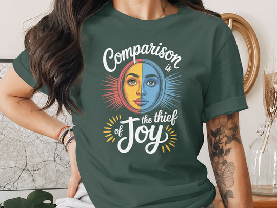 comparison is the thief of joy split sun-and-moon face — women’s t-shirt