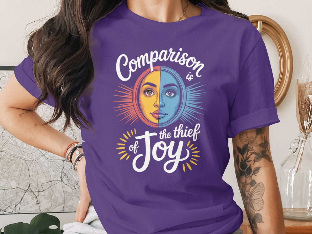 comparison is the thief of joy split sun-and-moon face — women’s t-shirt