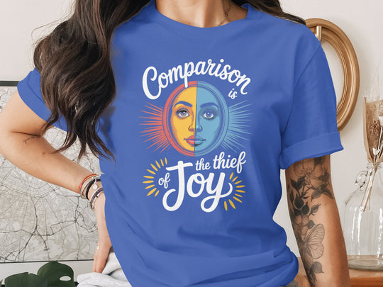 comparison is the thief of joy split sun-and-moon face — women’s t-shirt