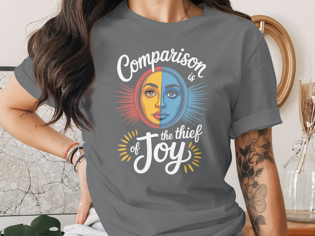 comparison is the thief of joy split sun-and-moon face — women’s t-shirt