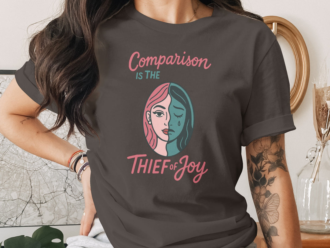 comparison is the thief of joy split-portrait graphic — women’s t-shirt