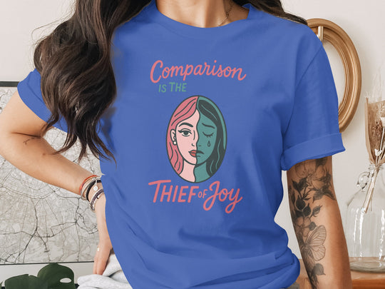 comparison is the thief of joy split-portrait graphic — women’s t-shirt