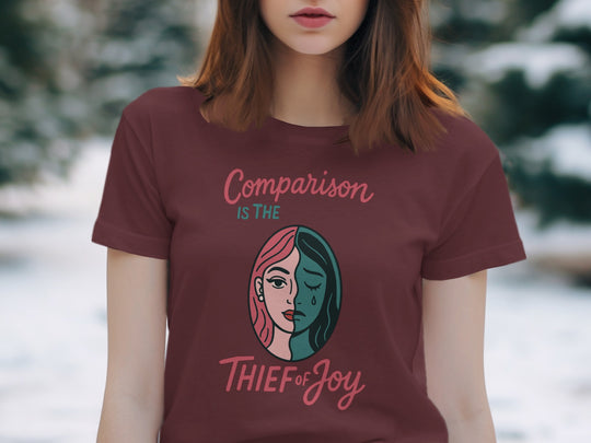 comparison is the thief of joy split-portrait graphic — women’s t-shirt