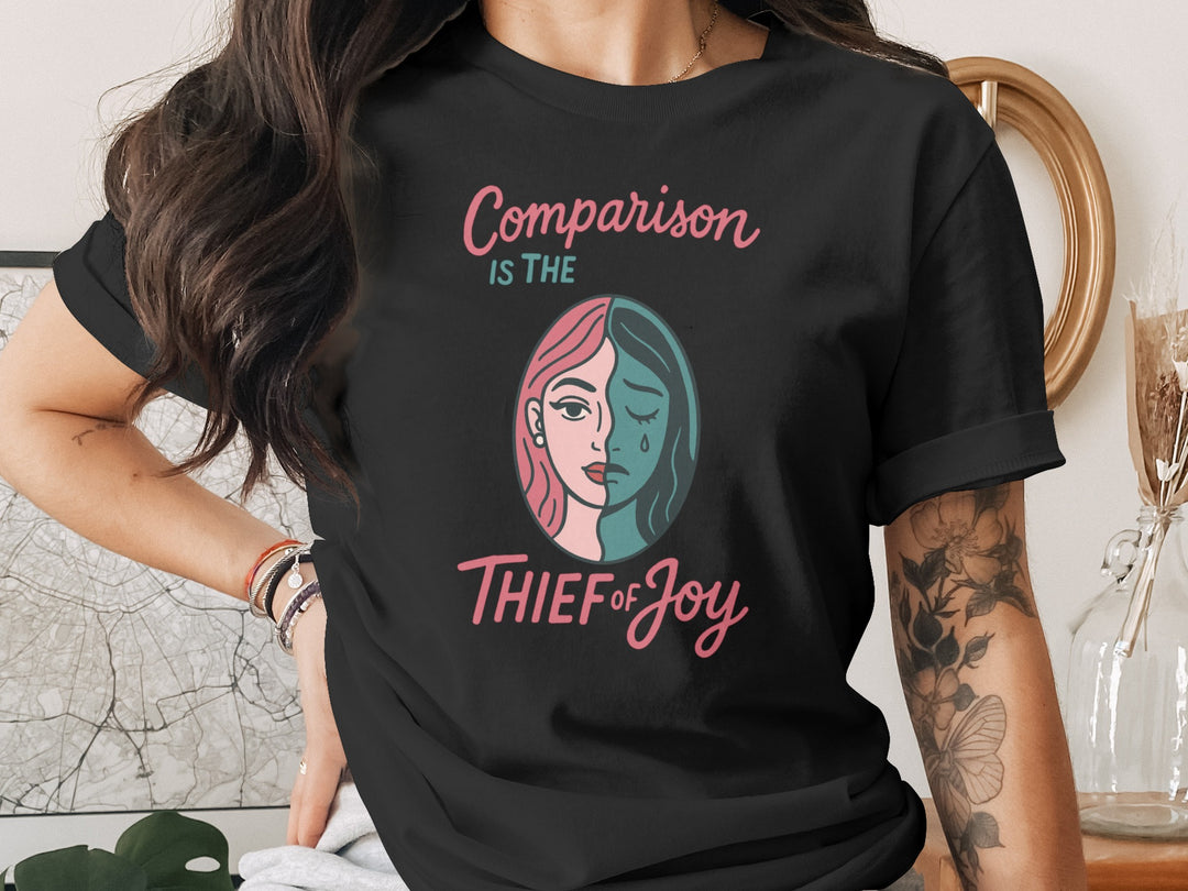 comparison is the thief of joy split-portrait graphic — women’s t-shirt