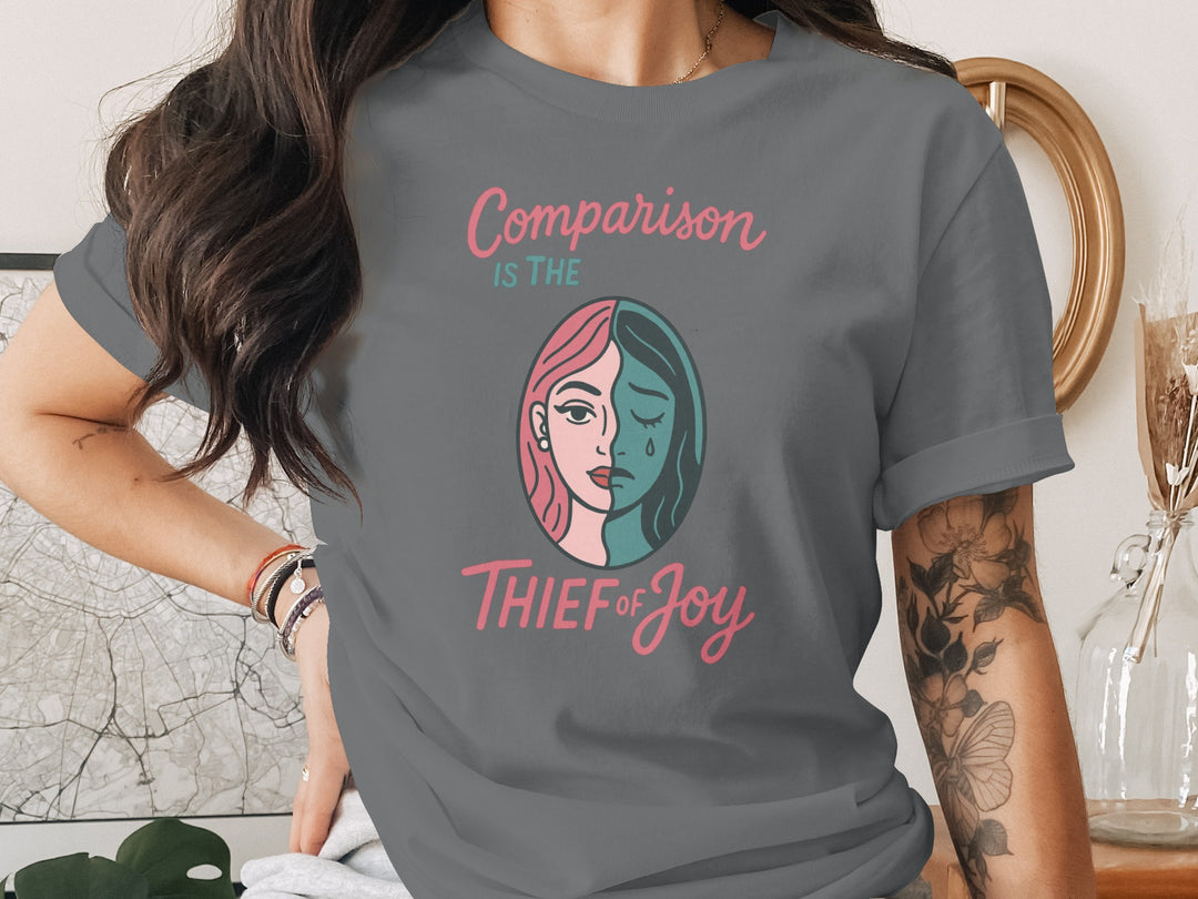 comparison is the thief of joy split-portrait graphic — women’s t-shirt