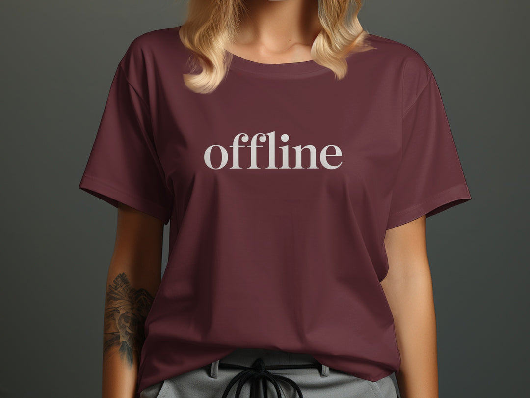 offline women’s t-shirt with minimalist corner wordmark on black