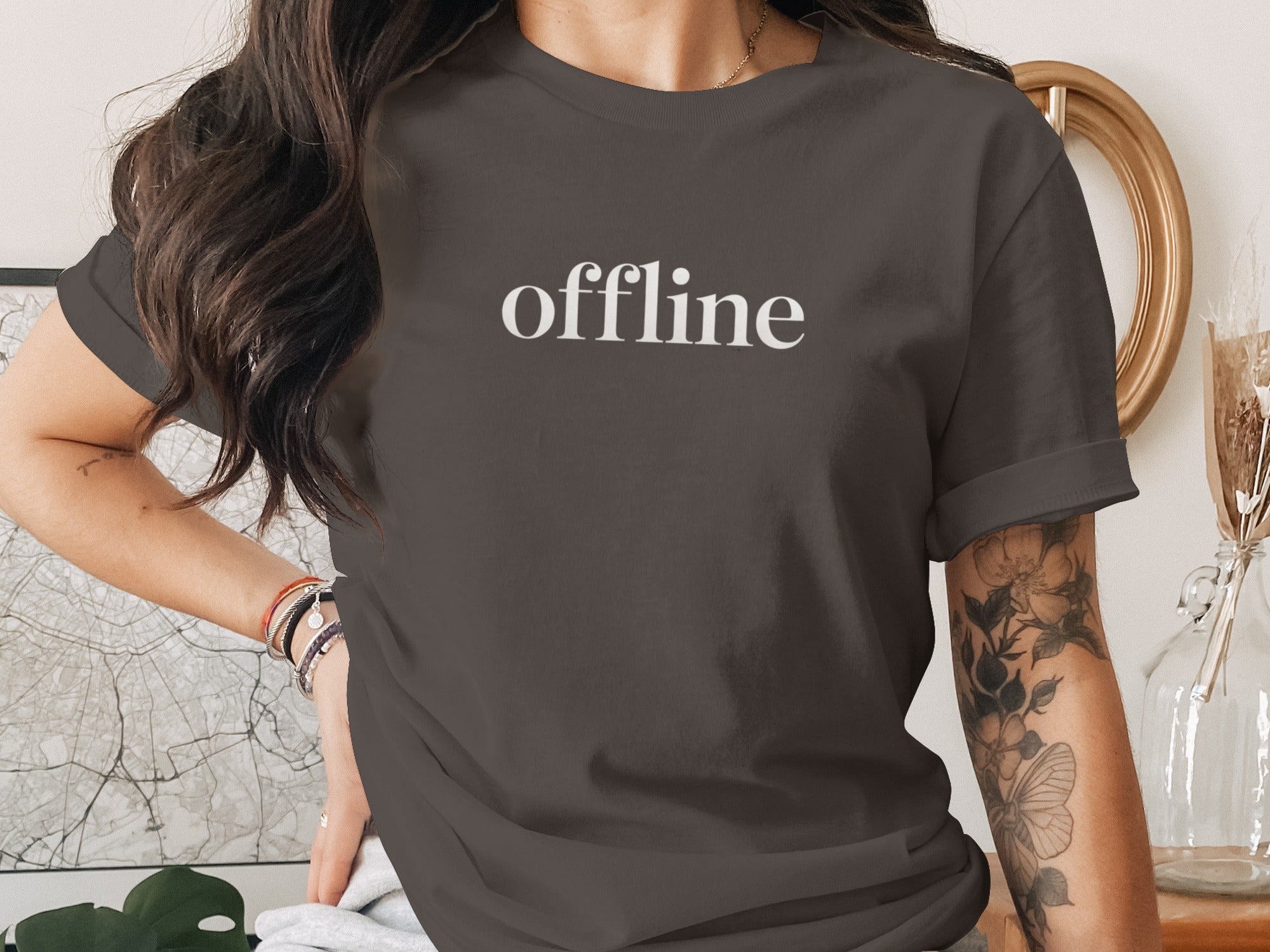 offline women’s t-shirt with minimalist corner wordmark on black