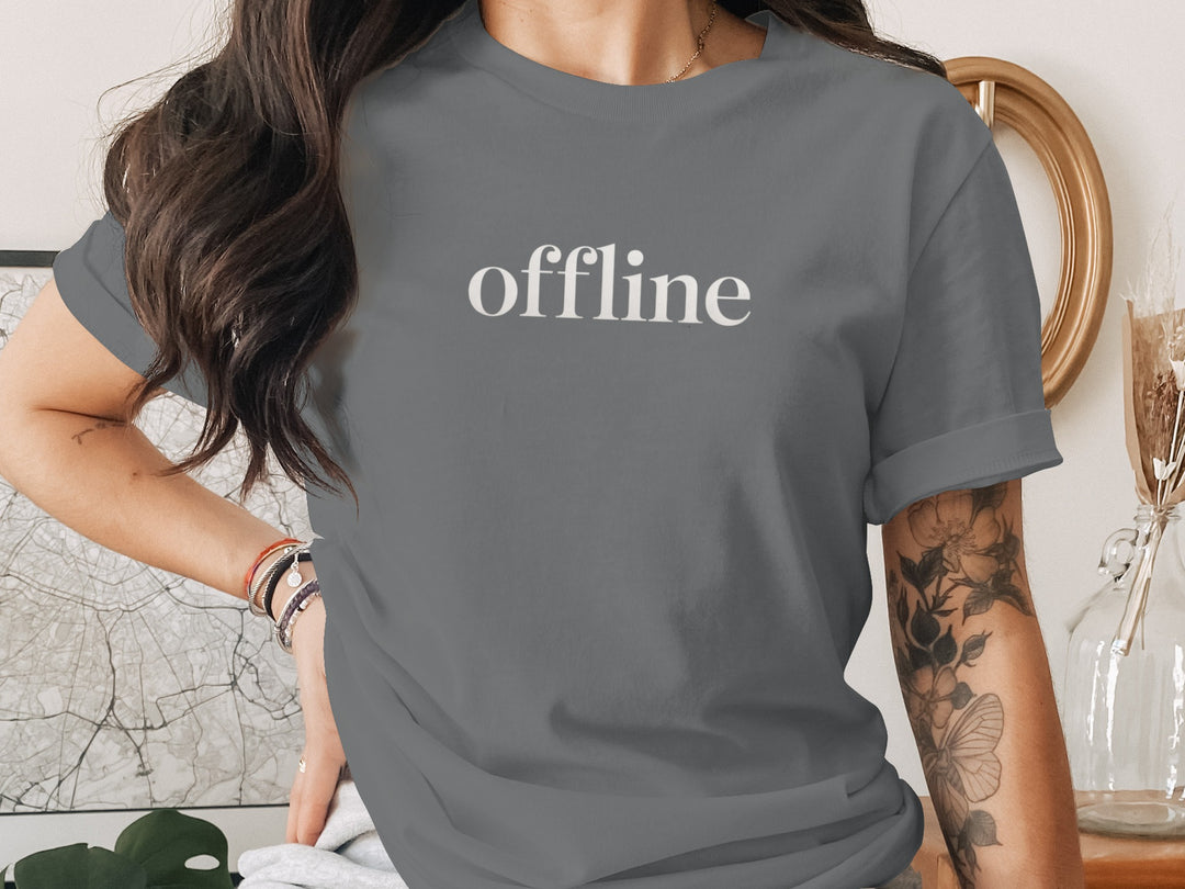 offline women’s t-shirt with minimalist corner wordmark on black