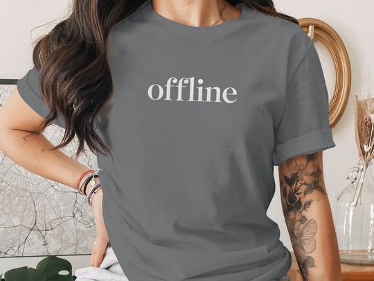 offline women’s t-shirt with minimalist corner wordmark on black