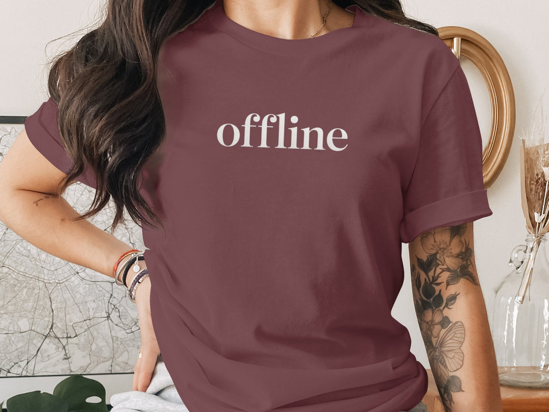 offline women’s t-shirt with minimalist corner wordmark on black