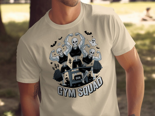 Halloween T-shirt for men with skeletons flexing around a heavy barbell, “Gym Squad” text