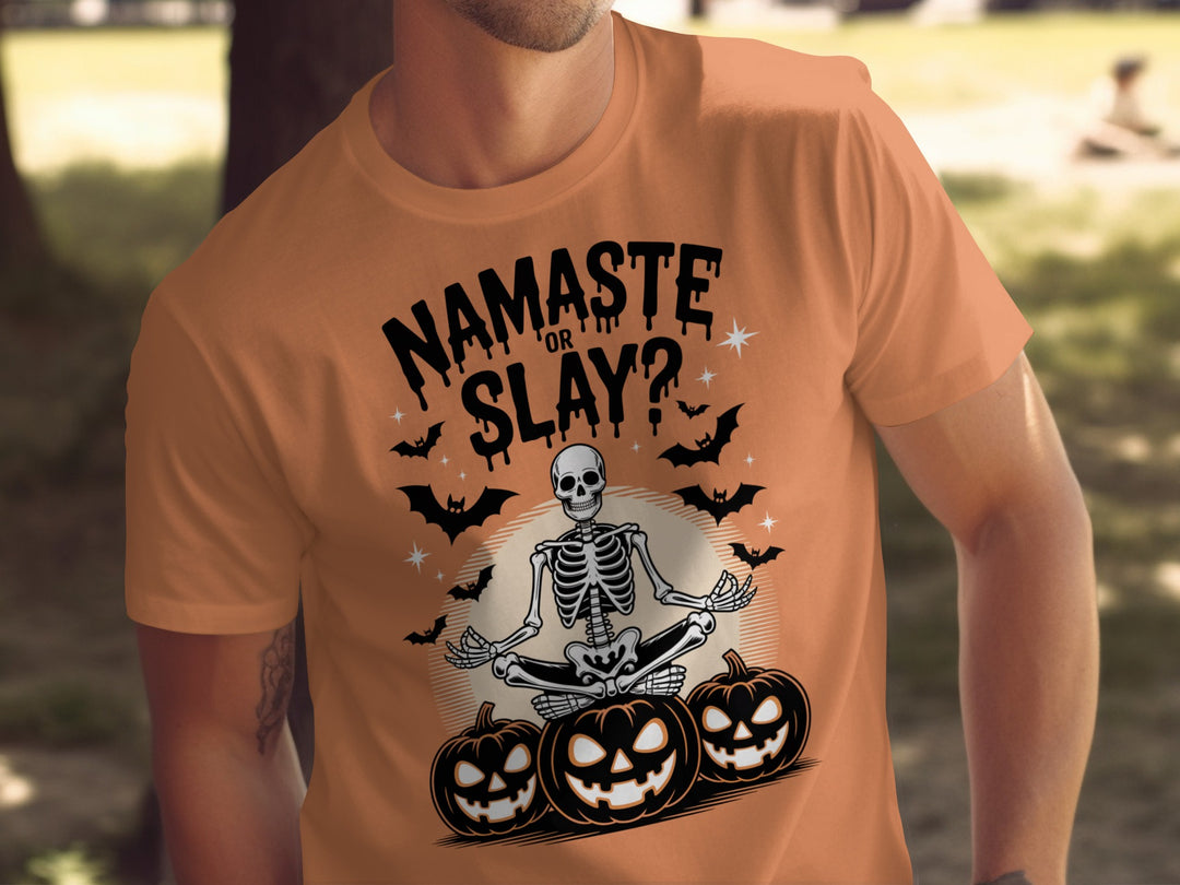 Halloween T-shirt for men with skeleton in yoga pose, pumpkins and bats, “Namaste or Slay?”
