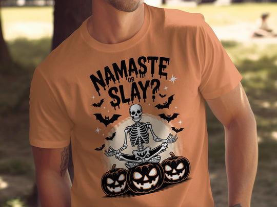 Halloween T-shirt for men with skeleton in yoga pose, pumpkins and bats, “Namaste or Slay?”