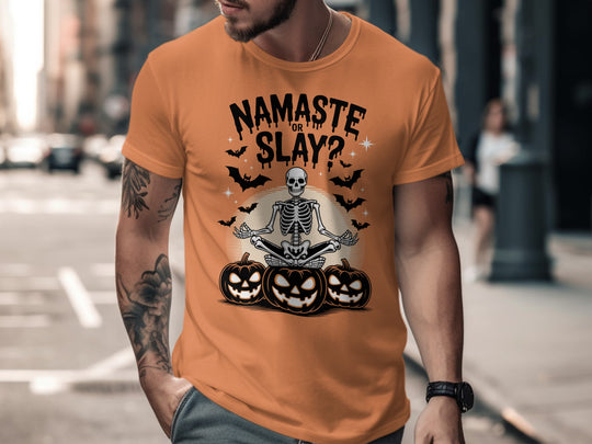 Halloween T-shirt for men with skeleton in yoga pose, pumpkins and bats, “Namaste or Slay?”