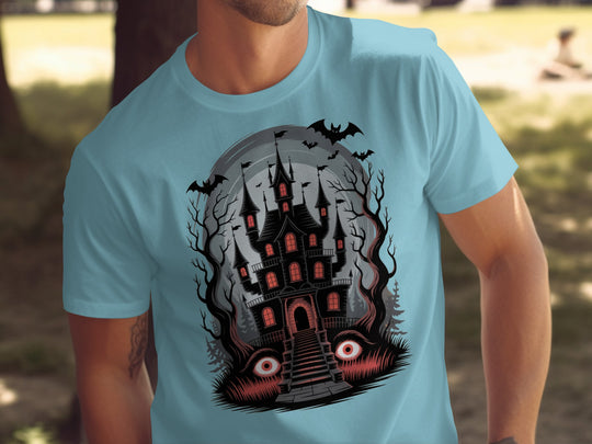 Halloween T-shirt for men with haunted mansion, red windows, bats and eerie eyes graphic