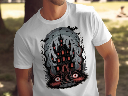 Halloween T-shirt for men with haunted mansion, red windows, bats and eerie eyes graphic