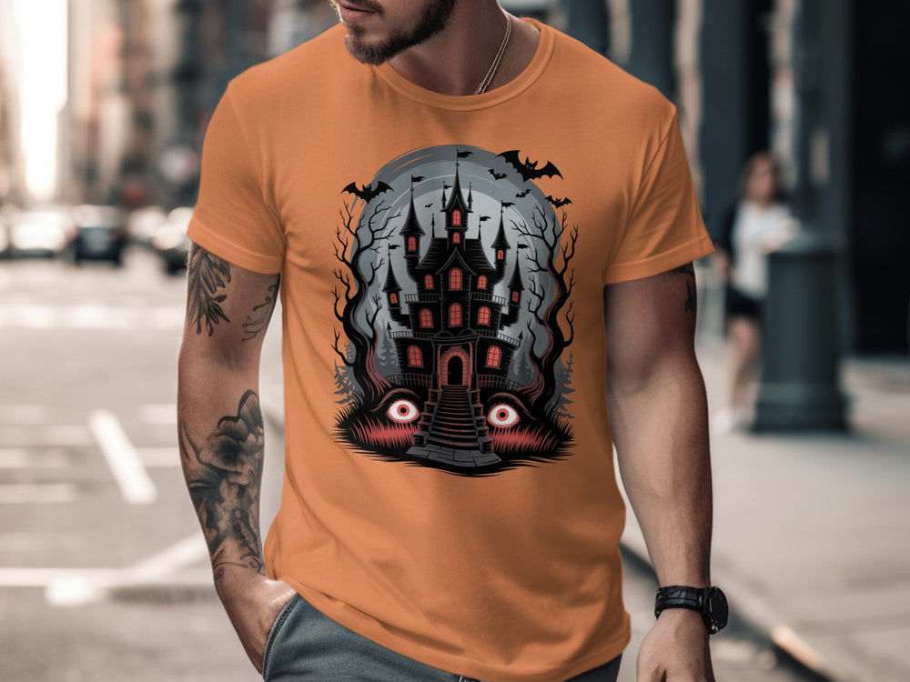 Halloween T-shirt for men with haunted mansion, red windows, bats and eerie eyes graphic