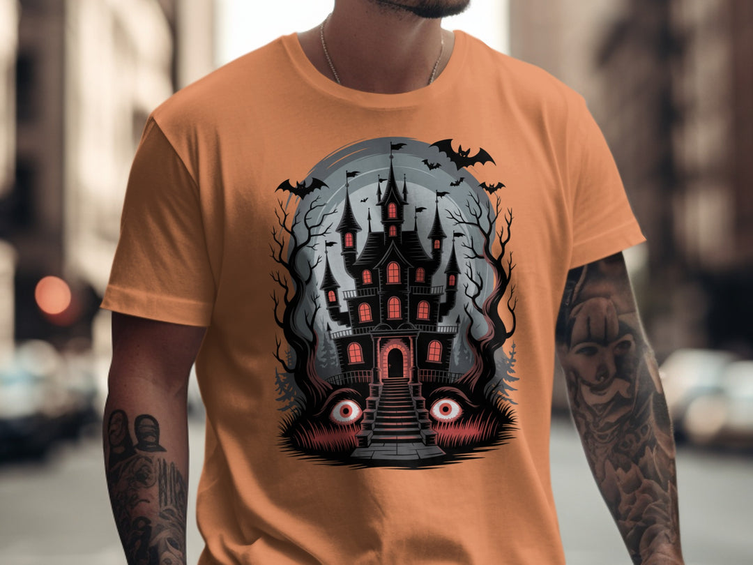 Halloween T-shirt for men with haunted mansion, red windows, bats and eerie eyes graphic