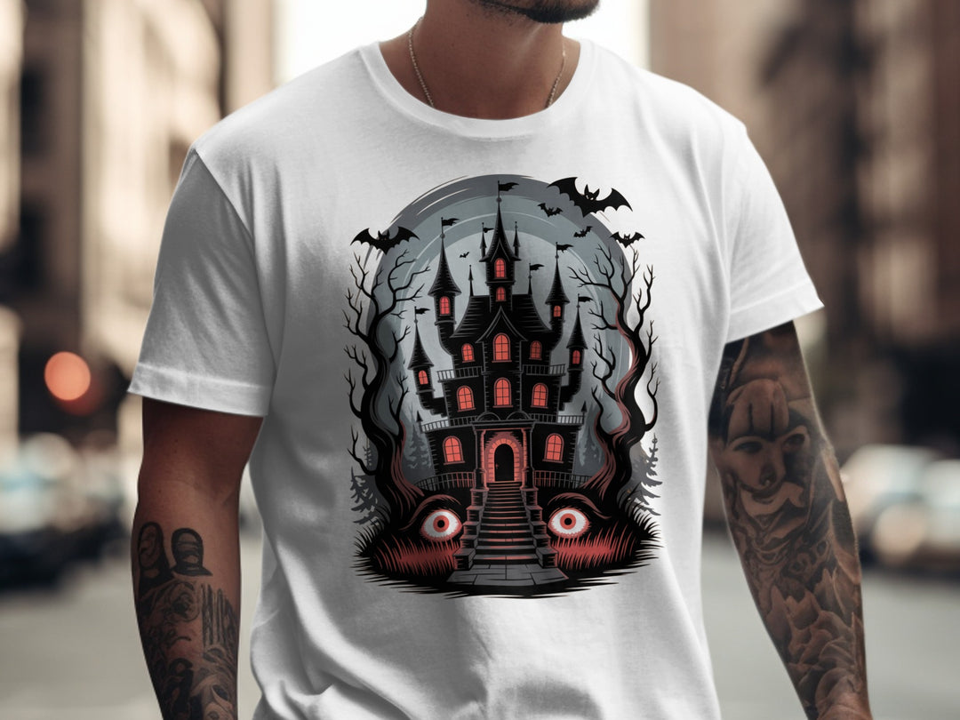 Halloween T-shirt for men with haunted mansion, red windows, bats and eerie eyes graphic