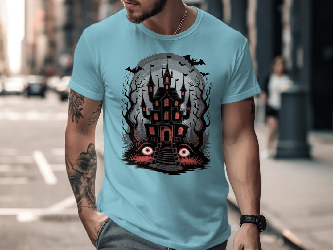 Halloween T-shirt for men with haunted mansion, red windows, bats and eerie eyes graphic