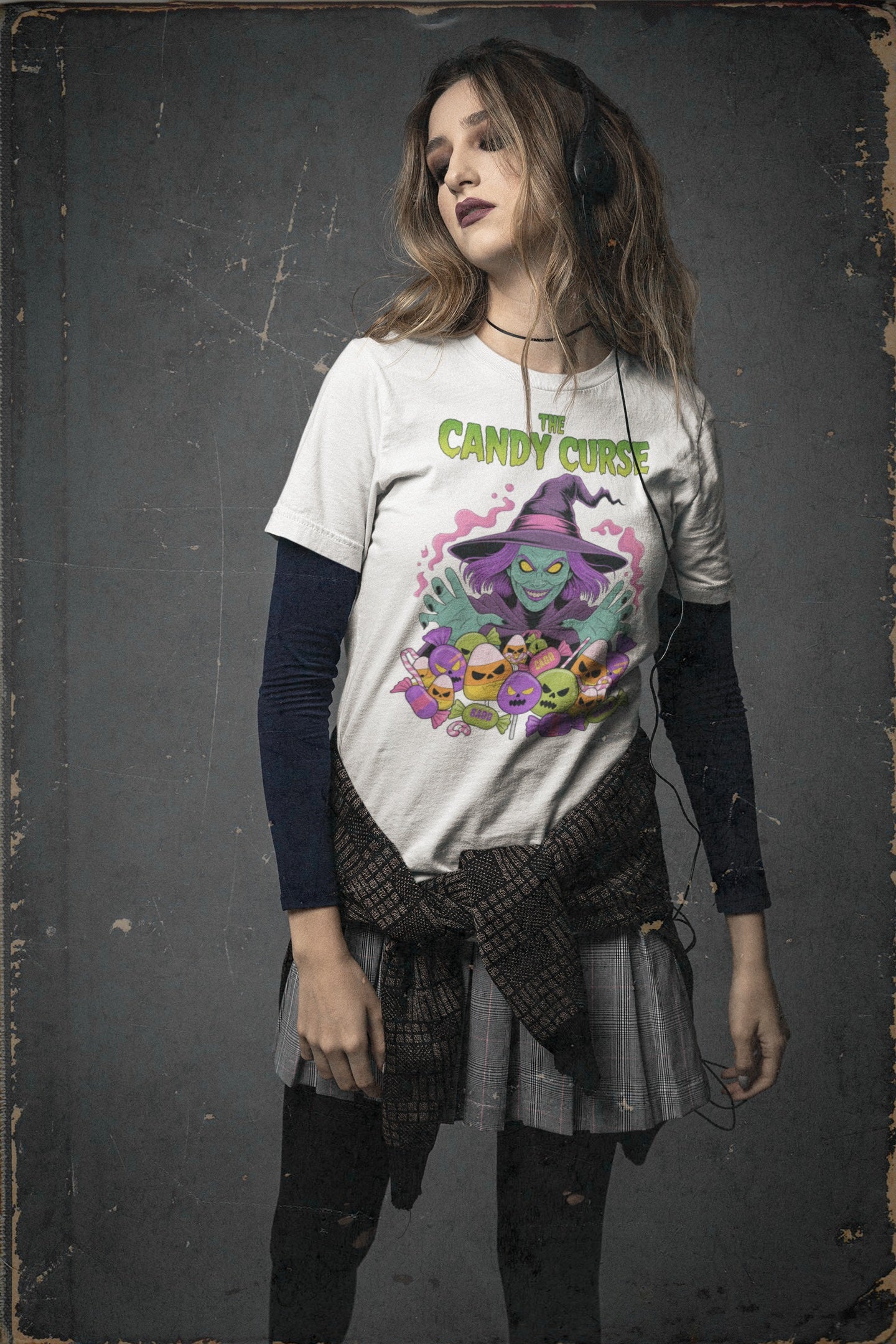 Woman wearing a t-shirt with a colorful graphic design on a dark background