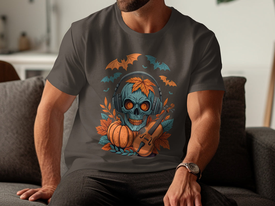 Person wearing a dark chocolate t-shirt with a colorful graphic design featuring a skull, pumpkins, and bats.