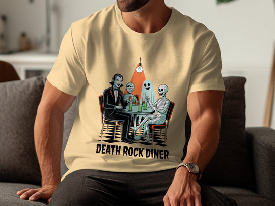 Person wearing a beige t-shirt with 'Death Rock Diner' graphic design.