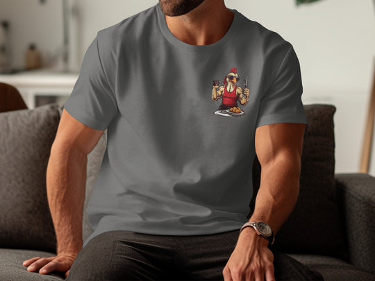 Person wearing a charcoal t-shirt with a graphic design of a cartoon character holding a pizza.