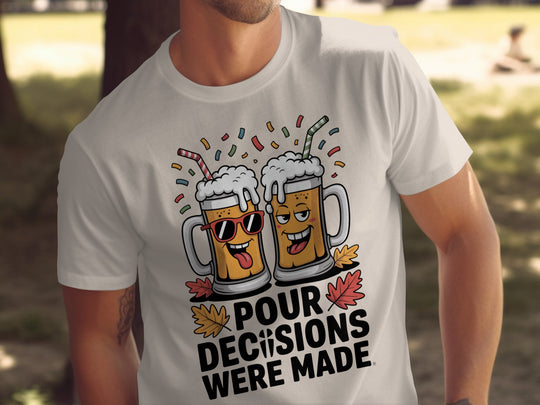 Person wearing a natural color t-shirt with cartoon beer mugs and text in an outdoor setting