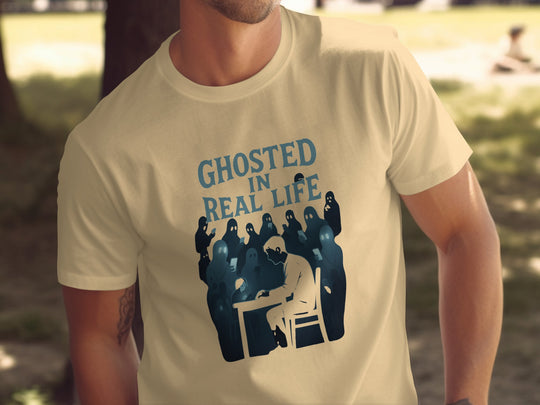 Person wearing a t-shirt with 'Ghosted in Real Life' graphic design.