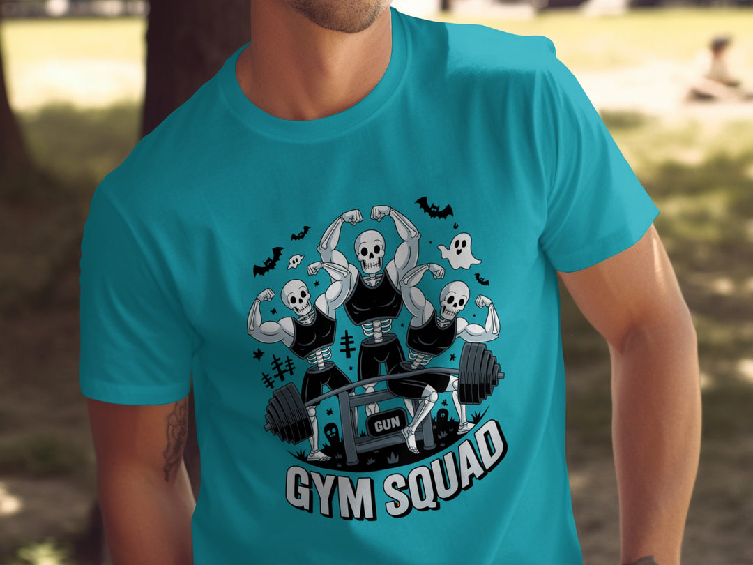 Person wearing a turquoise t-shirt with 'Gym Squad' graphic design.