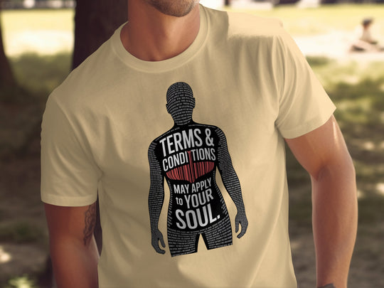 Beige t-shirt with a graphic design and text on a blurred outdoor background